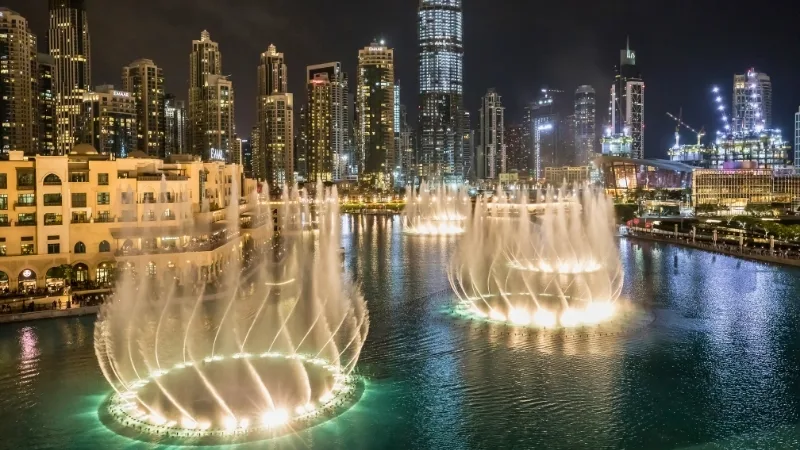 Dubai Fountain show at night near Dubai Mall and Burj Khalifa